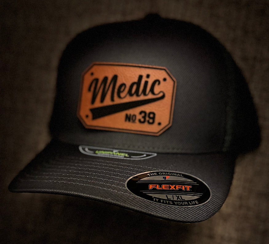 Cursive Passport - FlexFit Trucker Hat - Center of the Universe Woodworking & Engraving