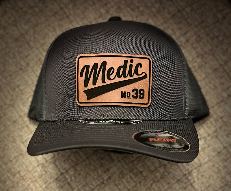 Cursive Passport - FlexFit Trucker Hat - Center of the Universe Woodworking & Engraving
