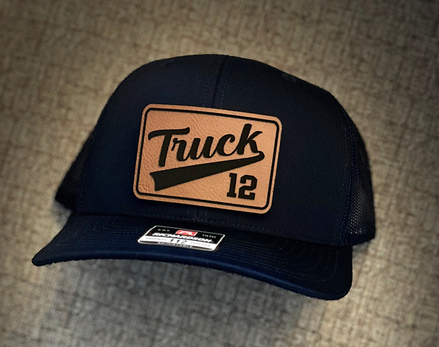 Cursive Passport - FlexFit Trucker Hat - Center of the Universe Woodworking & Engraving