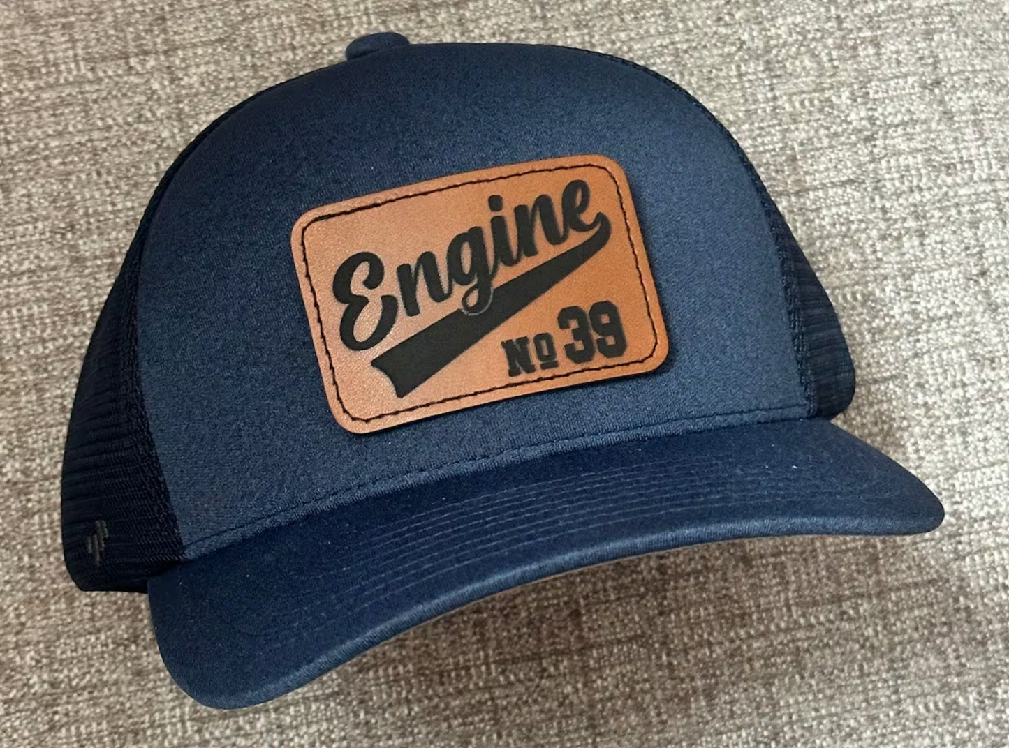 Cursive Passport - FlexFit Trucker Hat - Center of the Universe Woodworking & Engraving